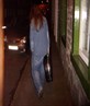 walking to party, guitar in hand