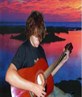 playin guitar in my back yard