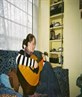 me (gross sideview :P) attempting2play geetar