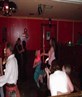 me pole dancing in the green dress