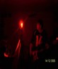 Moi, playing bass in the light.