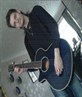 me and my acoustic guitar (her name is zoe)