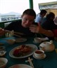 me enjoying my food too much..in hong kong :P