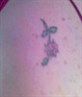 rose on right shoulder