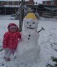 my lil girl and her snow man