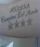 Can anyone work out wot my tattoo says?