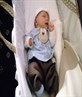 in his moses basket 3 wks how cute lol