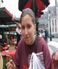 Me eatin chocolate in Brugges.