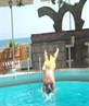 me diving into a pool on holiday