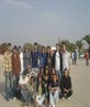 am second in ur right:standin in white tshirt