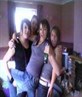 me in middle with mates at party