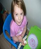 Emma enjjoying the cake to