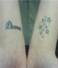 Thug Angel's Wrist Tattoos