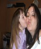 Getting a kiss from my lil sis