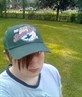 me in a green hat b4 haircut