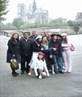 the family with Notre Dame in the back ground