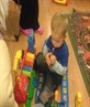 alex playin with his toys