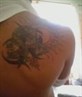 dragon with tribal over right shoulder