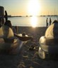 relaxing on the beach watching the sun set