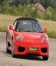 Smashing a Ferrari round the track, oooosh!